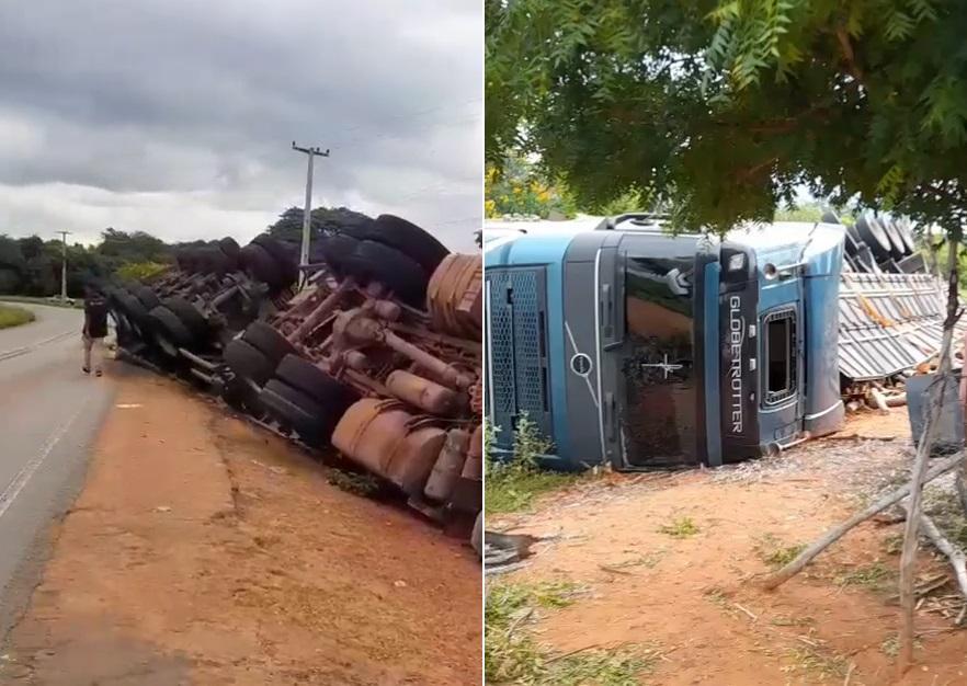 Motorista saiu ileso após caminhão carregado de madeira tombar
