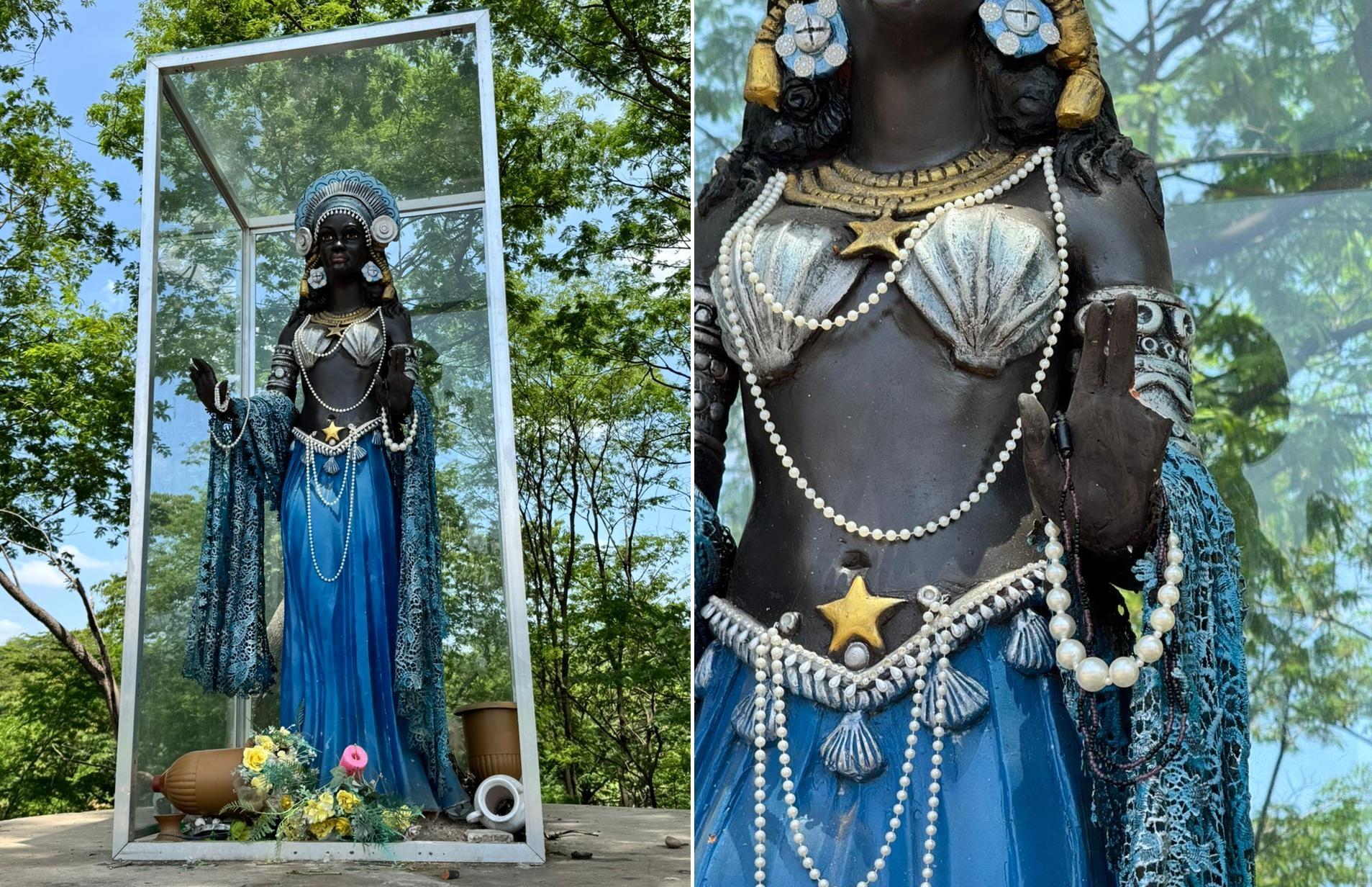 Além do aquário de vidro, a mão da estátua também foi quebrada