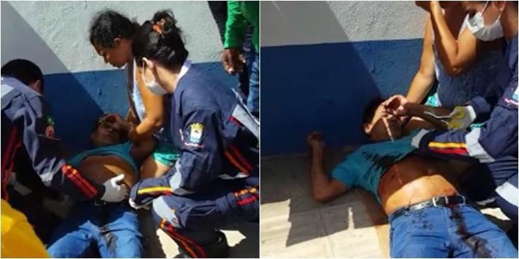 Populares usaram papelão para deitar vítima na calçada da agência bancária