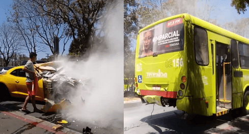 Camaro pega fogo ao colidir na traseira de ônibus