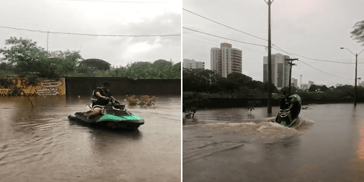 Homem aproveita rua alagada para pilotar jetski