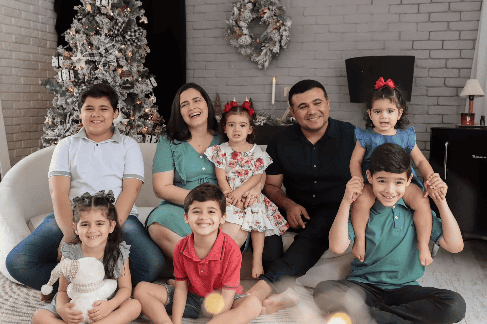 Advogado, esposa e seis filhos. Na foto, a esposa estava grávida do sétimo filho