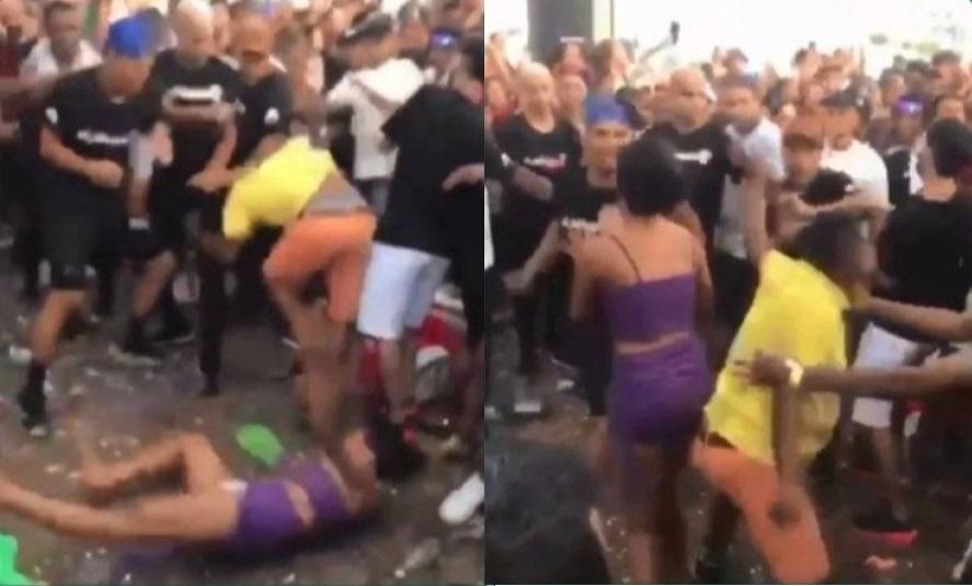 A mulher ficou caída ao chão após levar o soco