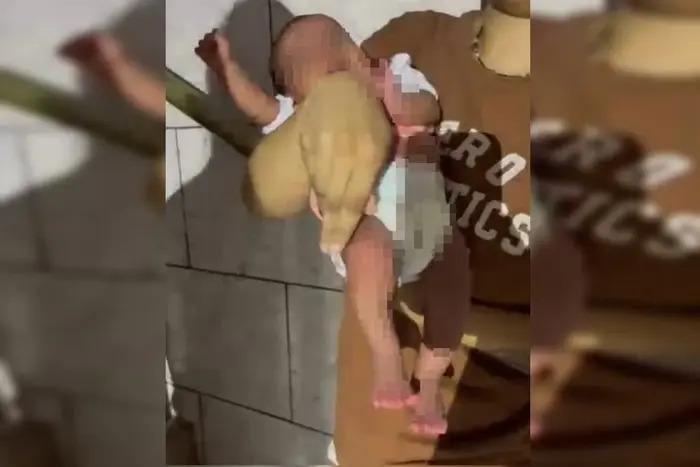 Mãe segura bebê de 27 dias negociado com empresária em Goiânia (GO)